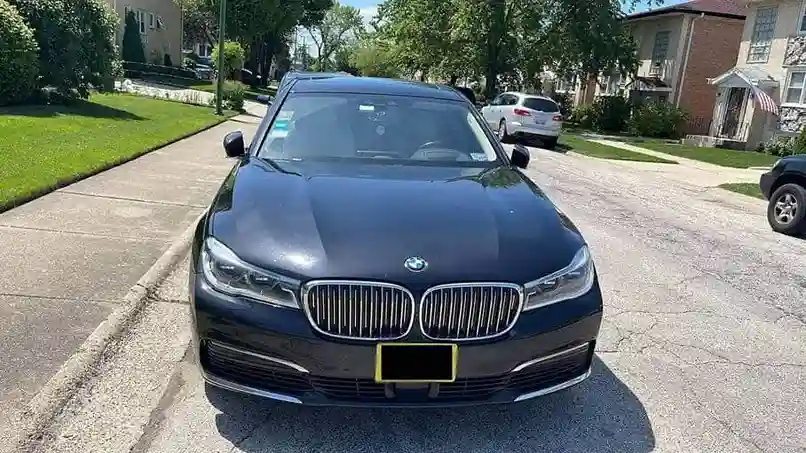 Our BMW luxury car parked on a road