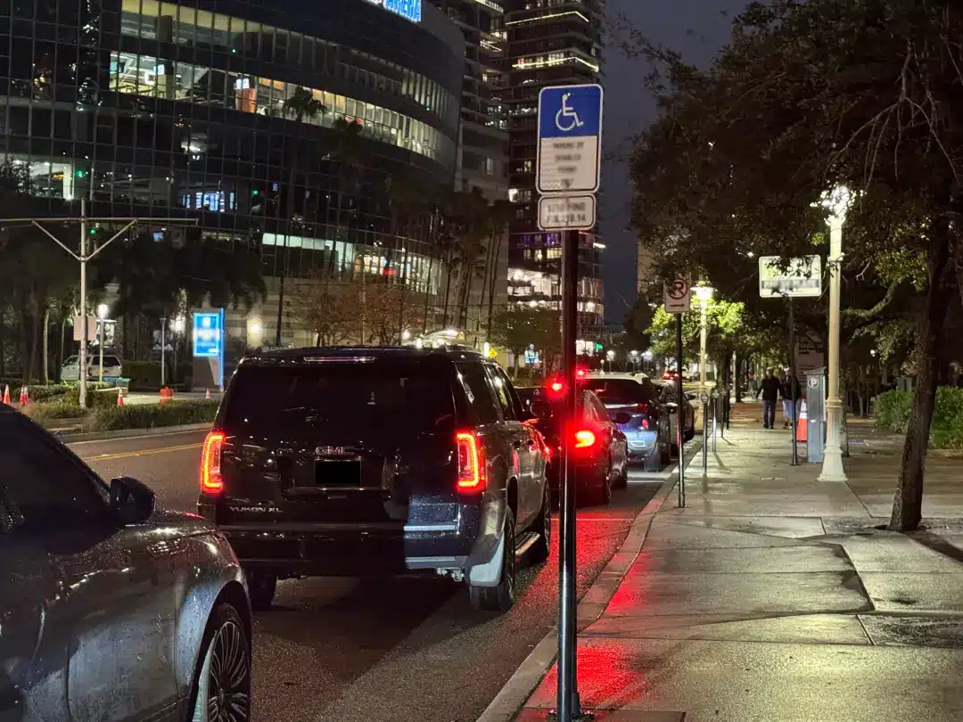 GMC Yukon Denali receiving luxury chauffeur service with professional care