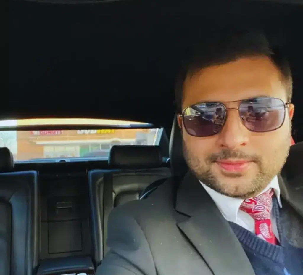 Luxury chauffeur driving a high-end car for premium ride service