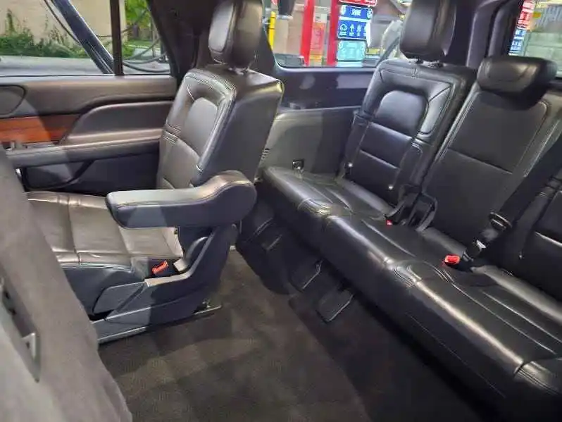 Luxurious Lincoln Navigator interior with leather seats and an advanced dashboard display