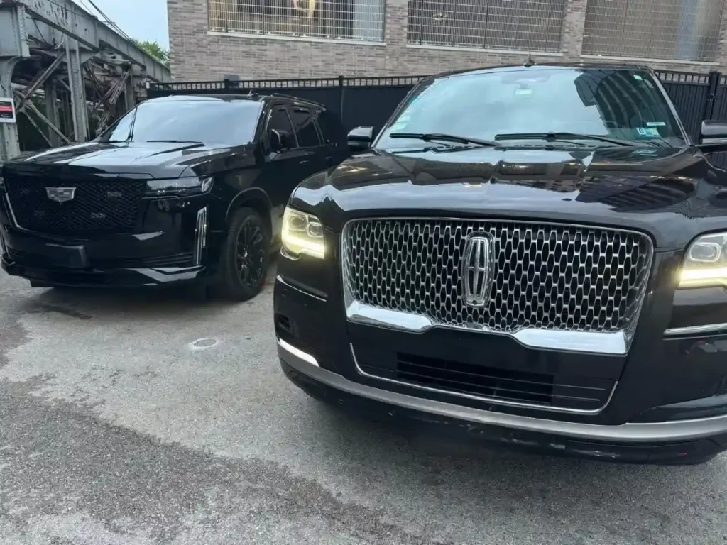 Two Black SUVS