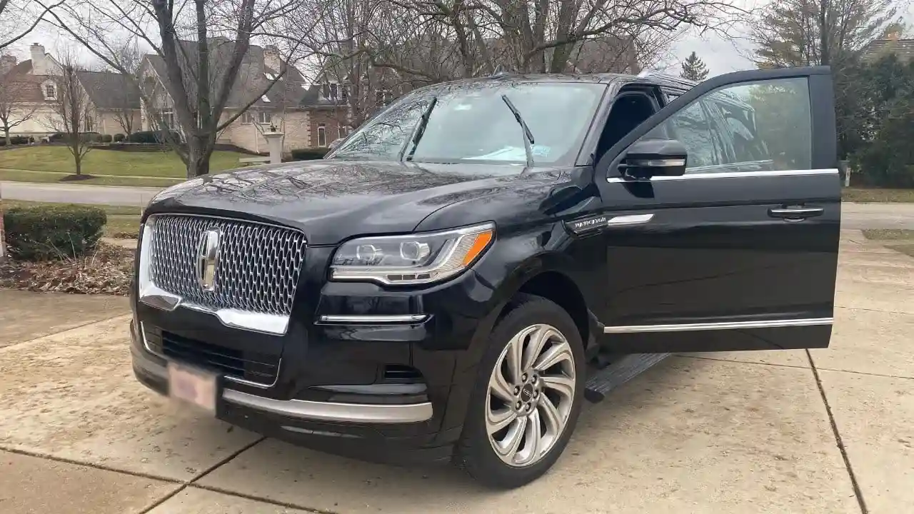 Luxury Black SUV With Side Door Open
