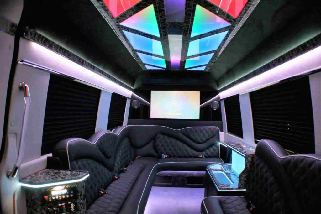 Luxurious limousine interior with plush leather seats, ambient lighting, and sleek modern design.