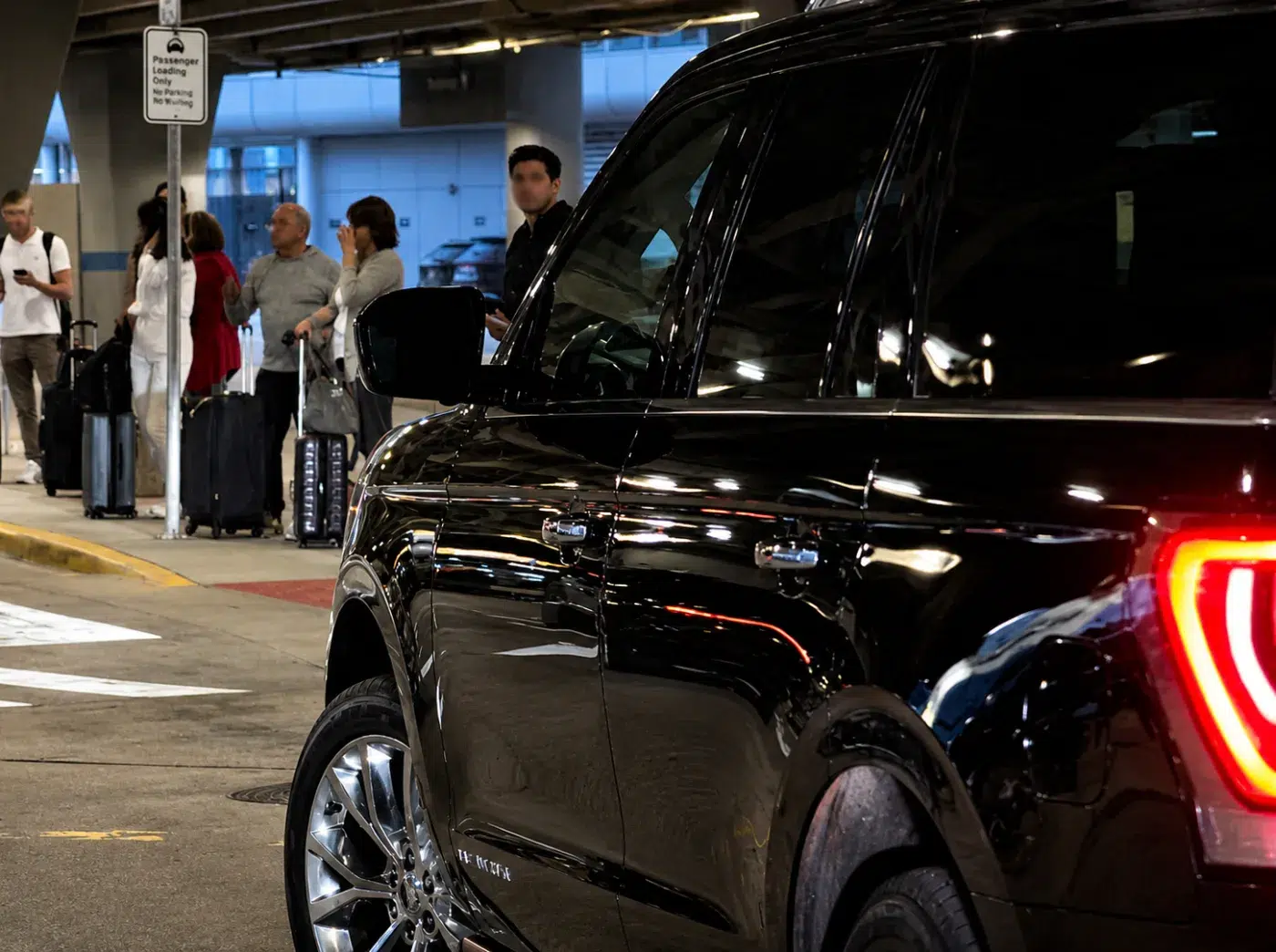 Airport curbside pickup with SUV